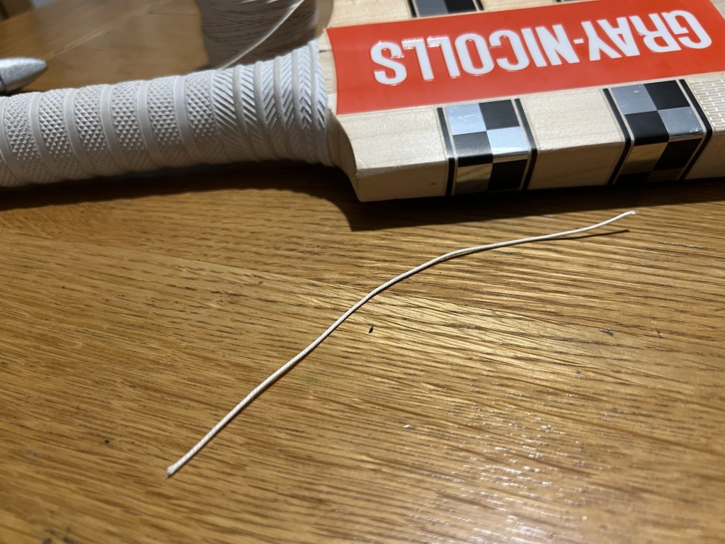Cricket Bat Gutting, Step 1: cut a little piece of string